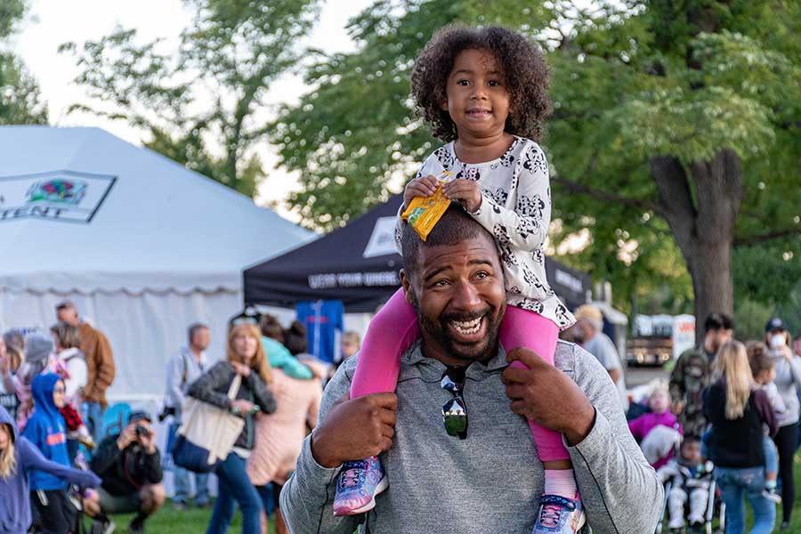 father and daughter at festival