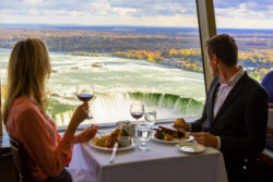 Couple dining at the Skylon Tower in the Fall.