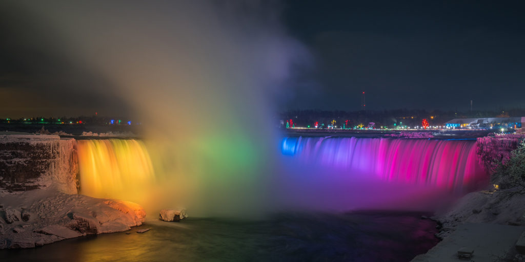 Falls illuminated at night in the winter